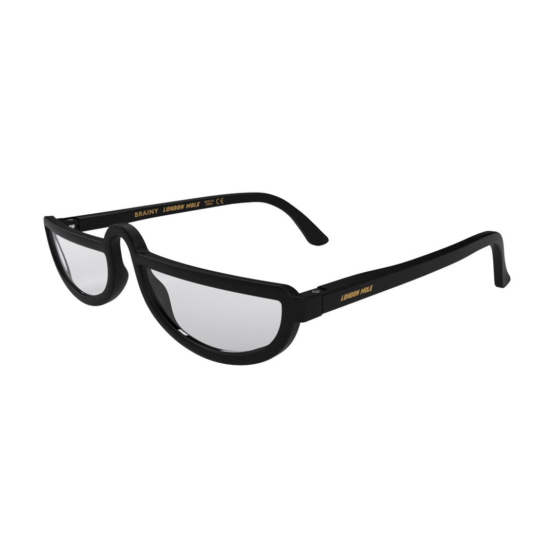 Open skew - Brainy Reading Glasses in matt black featuring an oversized circular frame and provide crystal clear vision. Available in a + 1, 1.5, 2, 2.5, 3 prescriptions.
