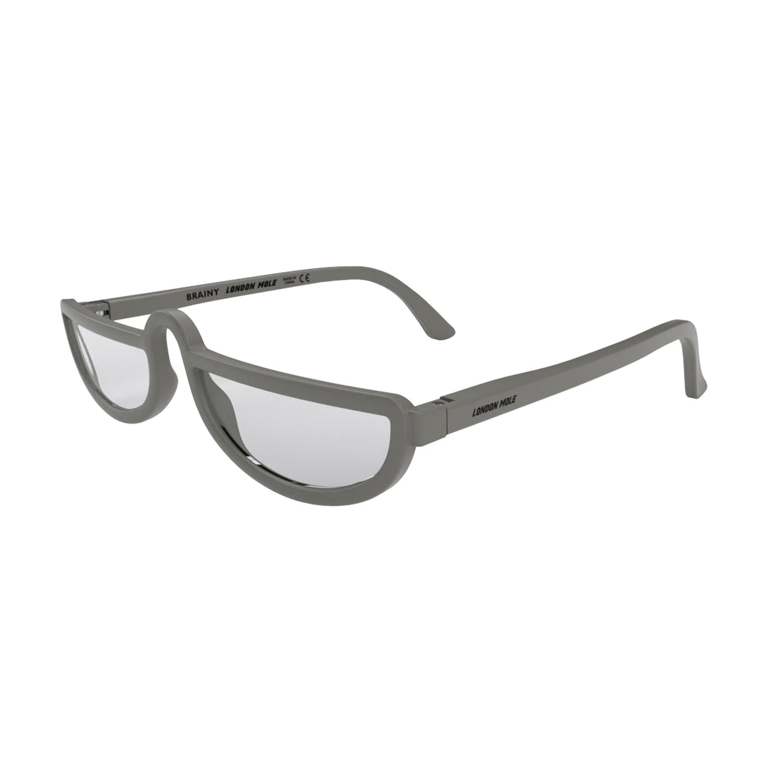 Open skew - Brainy Reading Glasses in matt grey featuring an oversized circular frame and provide crystal clear vision. Available in a + 1, 1.5, 2, 2.5, 3 prescriptions.