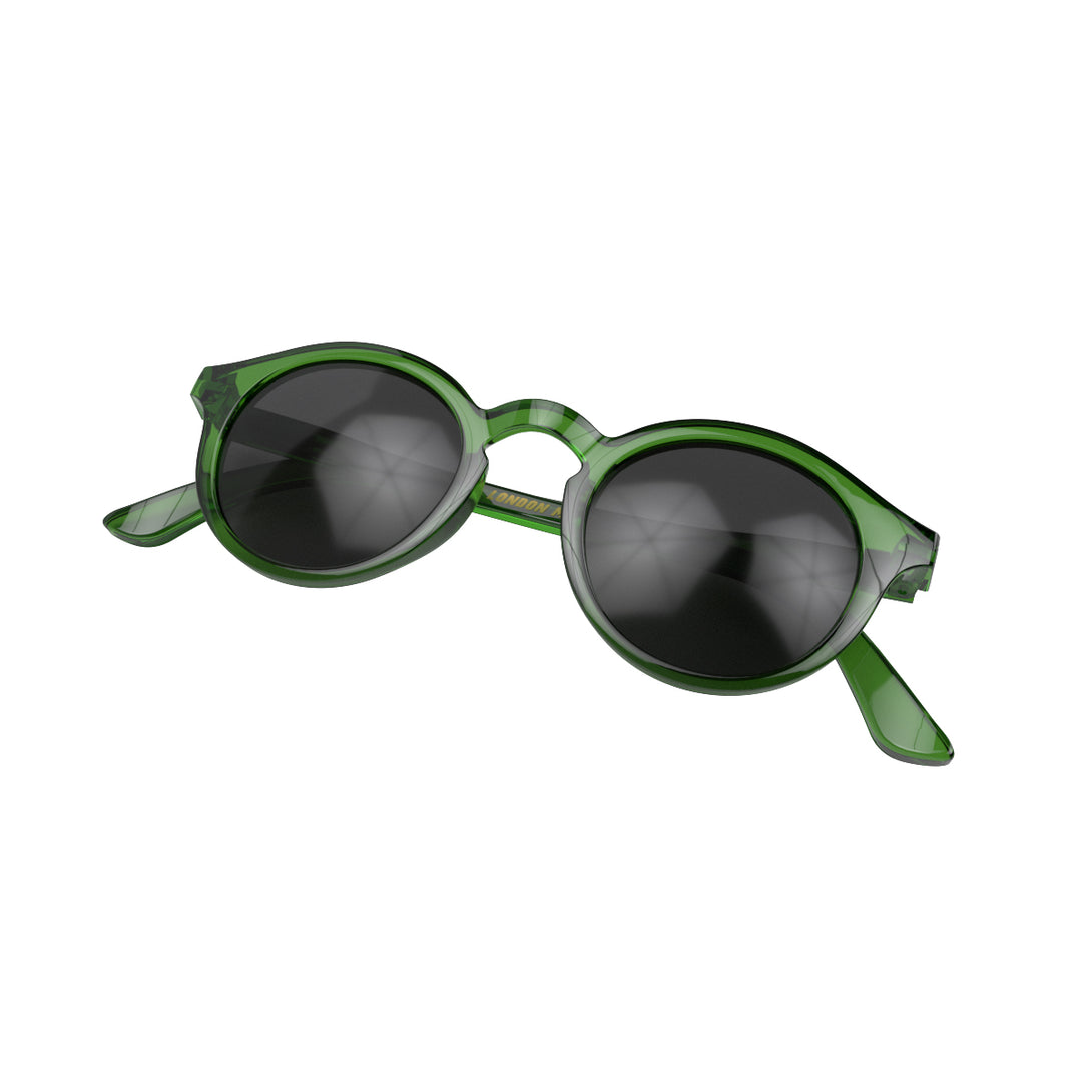 Folded skew - Graduate sunglasses in transparent green featuring a soft circle frame and black UV400 lenses. The finishing touch to every outfit while protecting your eyes. 
