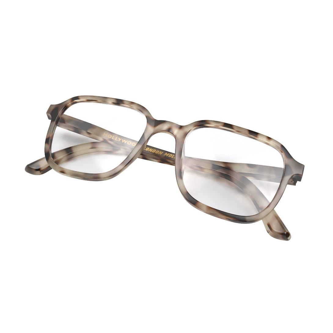 Folded skew - Hollywood Reading Glasses in pale tortoiseshell featuring a soft circle frame and provide crystal clear vision. Available in a + 1, 1.5, 2, 2.5, 3 prescriptions.