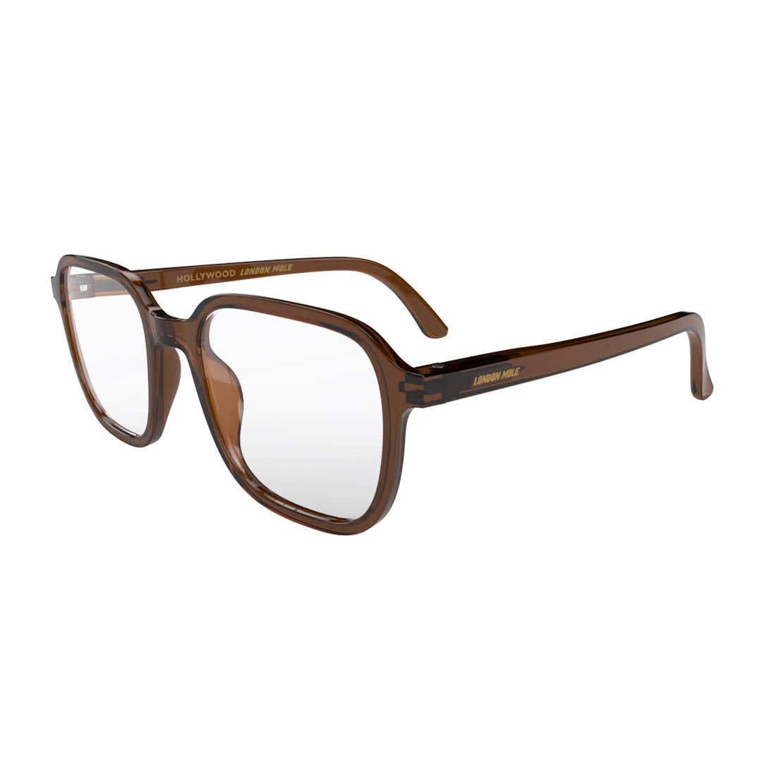Open skew - Hollywood Reading Glasses in transparent brown featuring a soft circle frame and provide crystal clear vision. Available in a + 1, 1.5, 2, 2.5, 3 prescriptions.