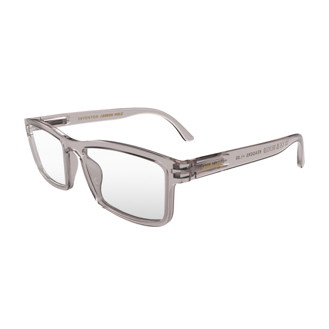 Open skew - Inventor Reading Glasses in transparent grey featuring a classic rectangle frame made out of recycled materials and provide crystal clear vision. Available in a + 1, 1.5, 2, 2.5, 3 prescriptions.