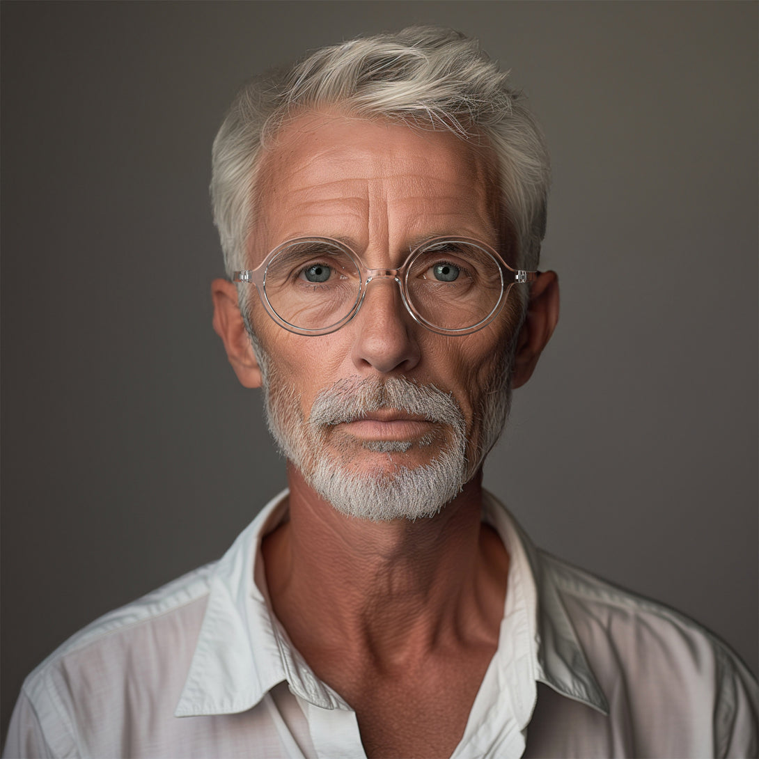 Male model - Artist Reading Glasses featuring an oversized circular transparent frame and provide crystal clear vision. Available in a + 1, 1.5, 2, 2.5, 3 prescriptions.