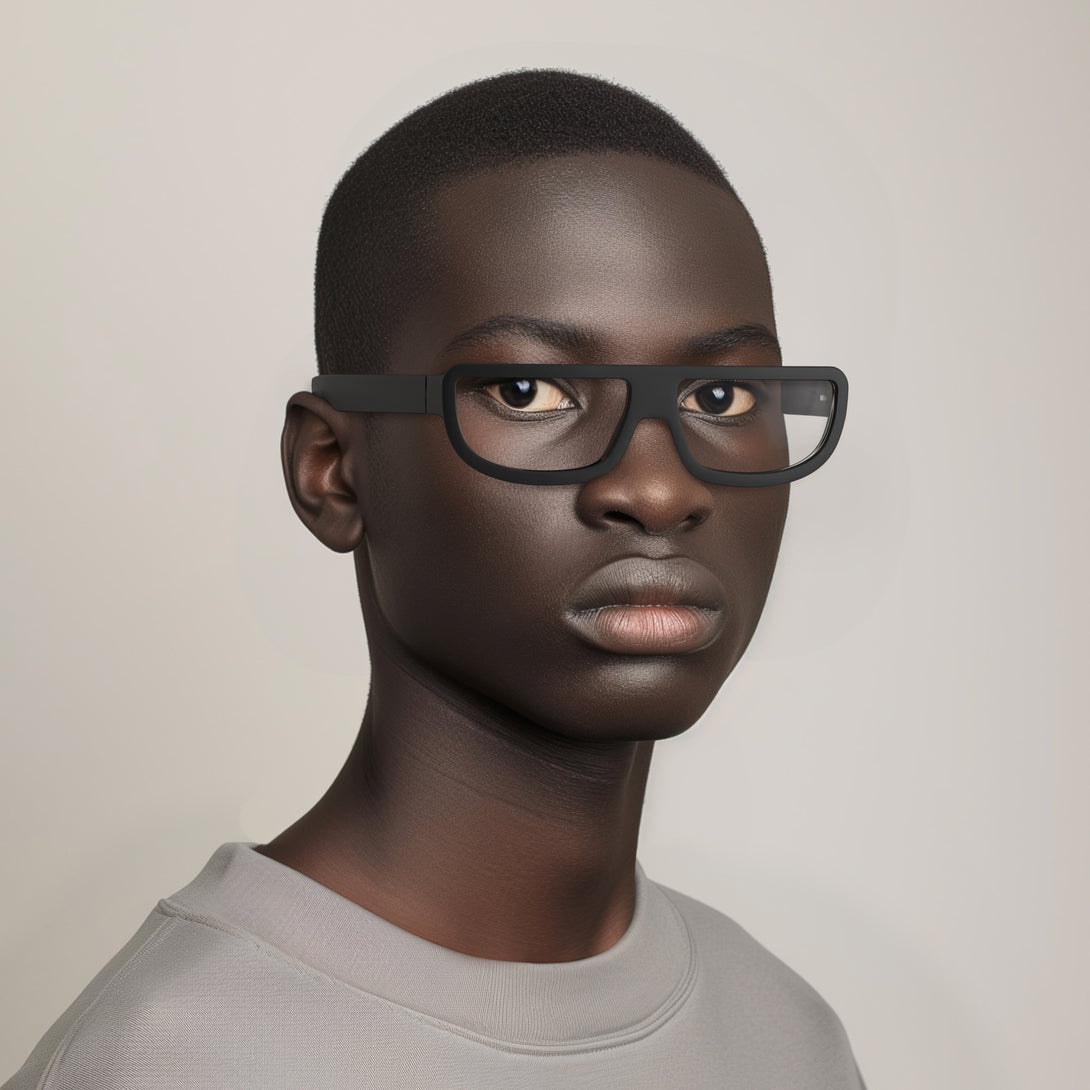 Male model - Feisty Reading Glasses in matt black featuring a utilitarian, striaght top line frame and provide crystal clear vision. Available in a + 1, 1.5, 2, 2.5, 3 prescriptions.