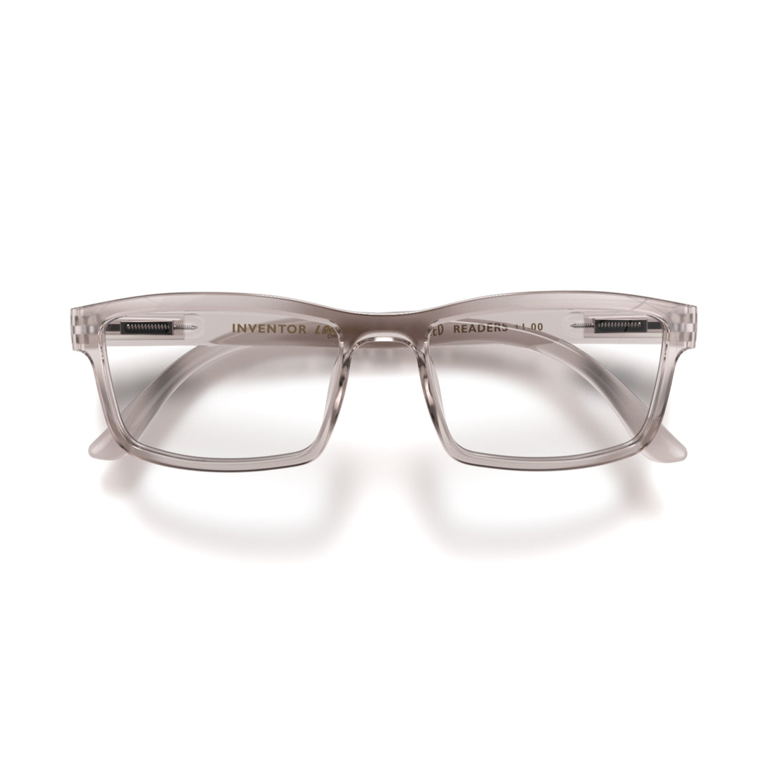 Front - Inventor Reading Glasses in transparent grey featuring a classic rectangle frame made out of recycled materials and provide crystal clear vision. Available in a + 1, 1.5, 2, 2.5, 3 prescriptions.