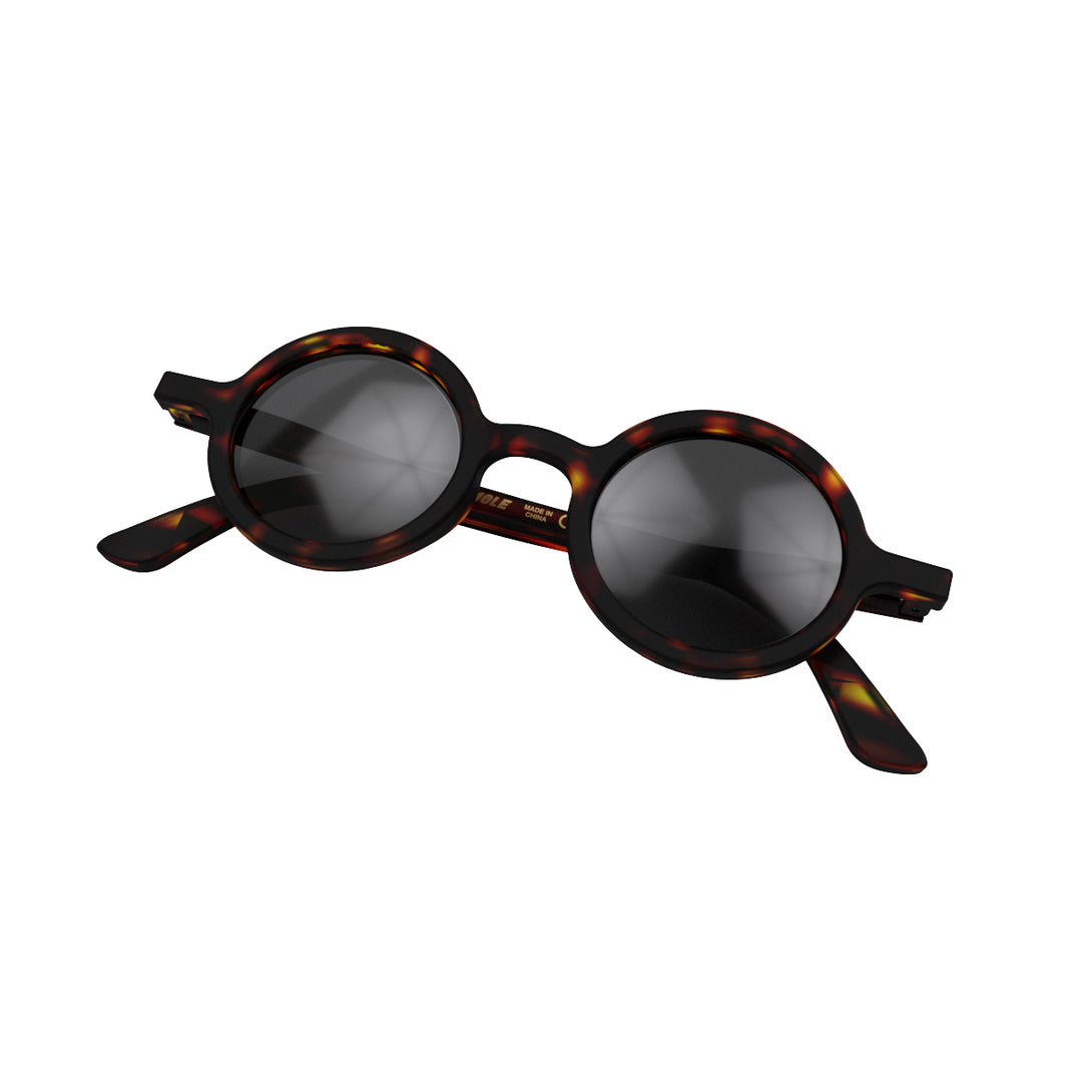 Folded skew - Moly sunglasses matt tortoiseshell featuring an eccentrically round frame and black UV400 lenses. The perfect accessory.