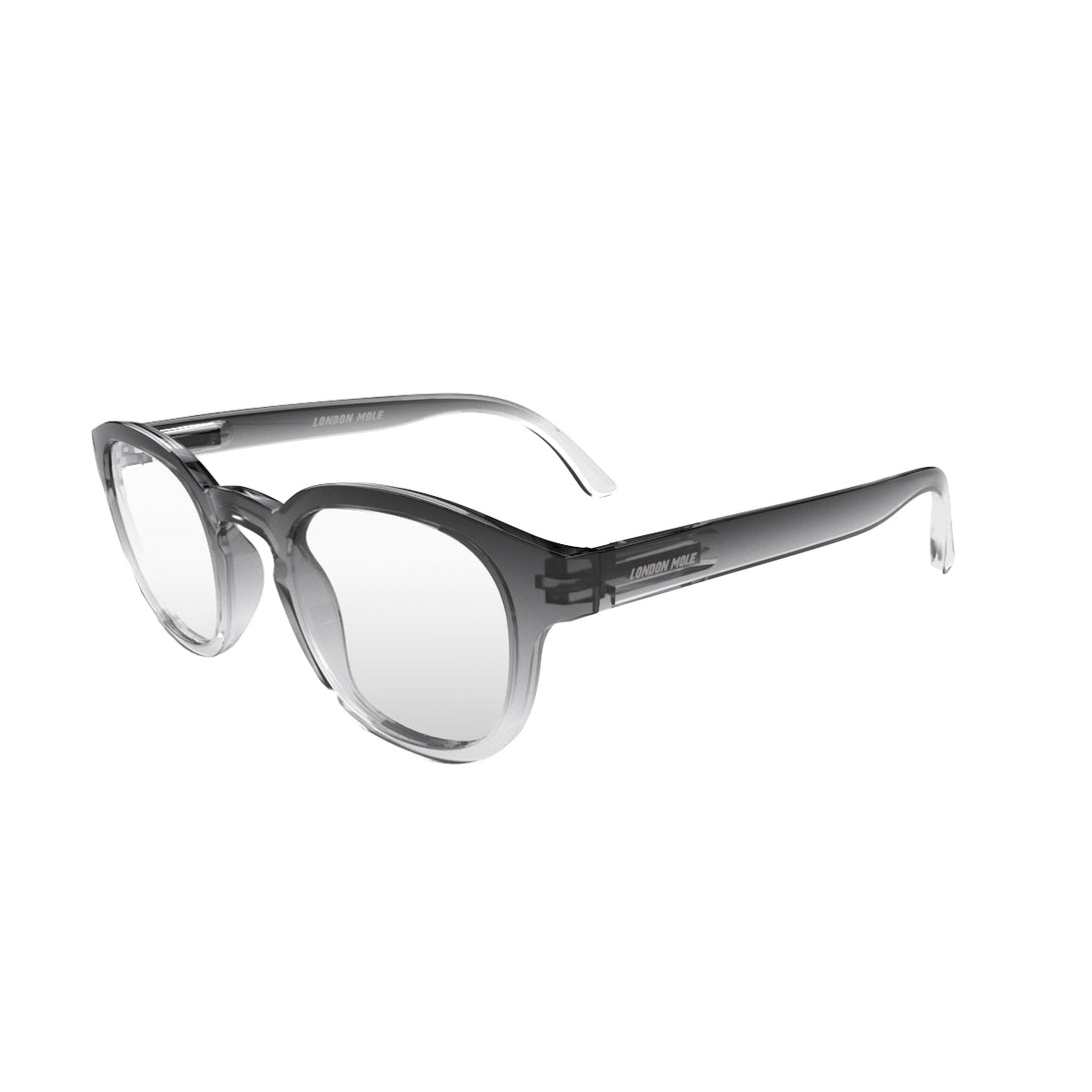 Open skew - Monalux Blue Blocker Glasses in black fade featuring a the classic Oxford, rounded frame and the ability to protect your eyes from artificial blue light. Ideal for fashion accessories, screen time, office work, gaming, scrolling on a mobile, and watching TV. 