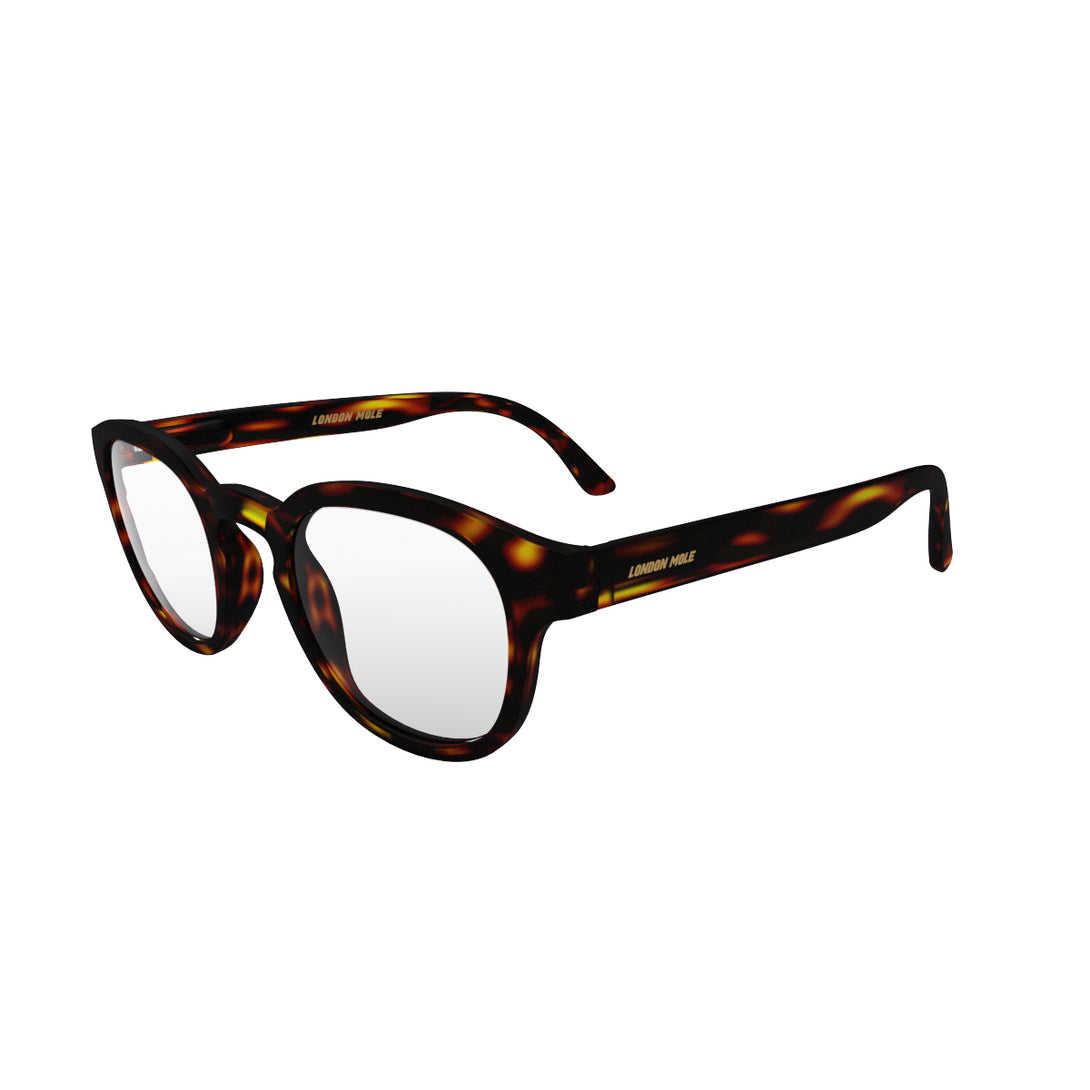 Open skew - Monalux Blue Blocker Glasses in matt tortoiseshell featuring a the classic Oxford, rounded frame and the ability to protect your eyes from artificial blue light. Ideal for fashion accessories, screen time, office work, gaming, scrolling on a mobile, and watching TV. 