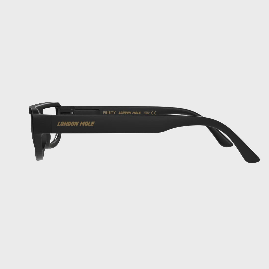 360 Turning Animation - Feisty Reading Glasses in matt black featuring a utilitarian, striaght top line frame and provide crystal clear vision. Available in a + 1, 1.5, 2, 2.5, 3 prescriptions.