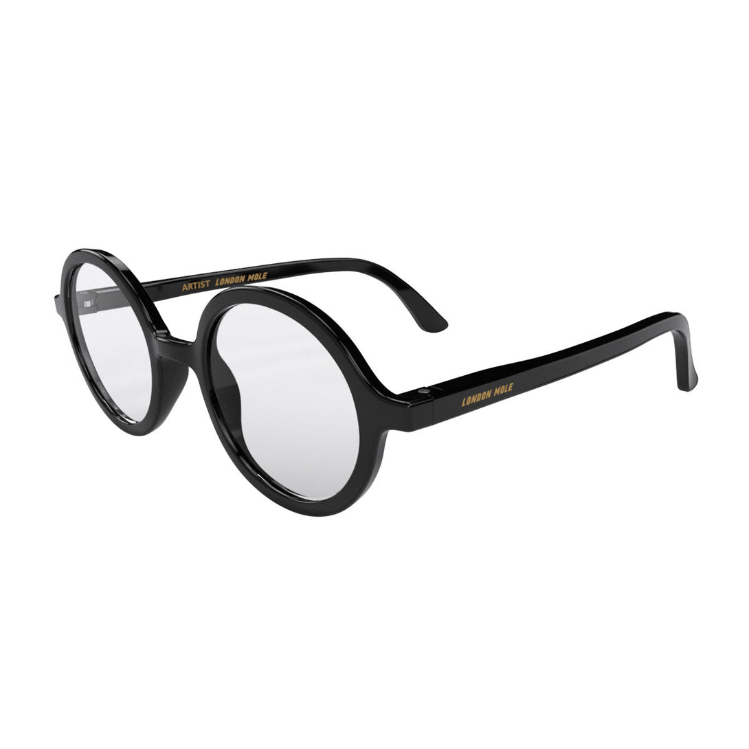 Skew 2 - Artist Reading Glasses in gloss black featuring an oversized circular frame and provide crystal clear vision. Available in a + 1, 1.5, 2, 2.5, 3 prescriptions.