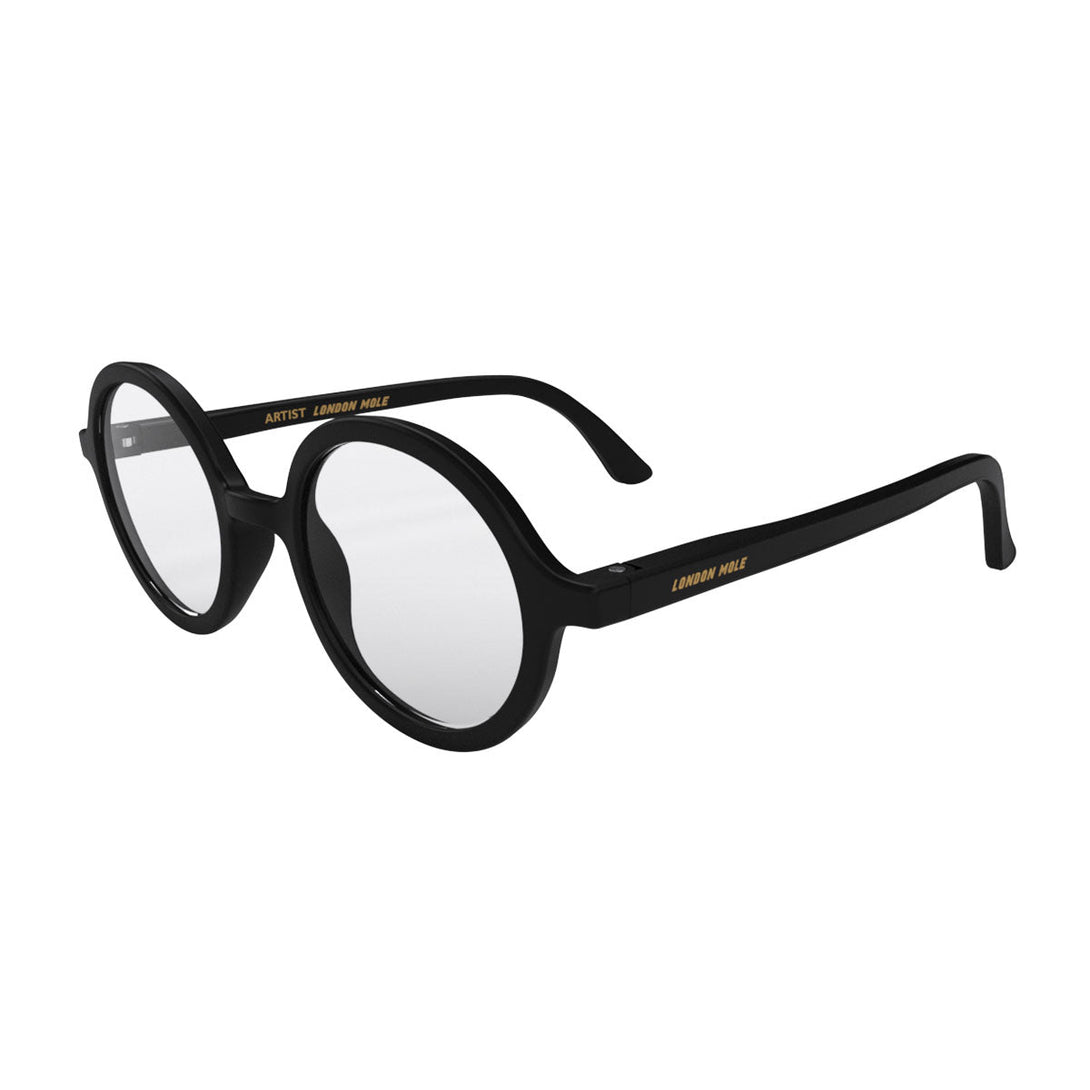 Skew - Artist Blue Blocker Glasses in matt black featuring an oversized circular frame and the ability to protect your eyes from artificial blue light. Ideal for fashion accessories, screen time, office work, gaming, scrolling on a mobile, and watching TV. 