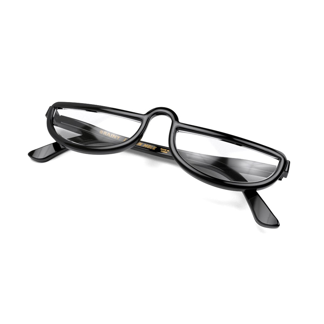 Closed skew - Brainy Reading Glasses in gloss black featuring a half-moon frame and provide crystal clear vision. Available in a + 1, 1.5, 2, 2.5, 3 prescriptions.