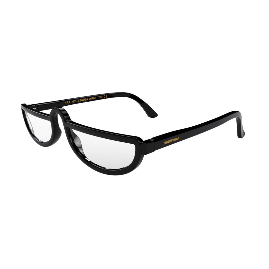 Open skew - Brainy Blue Blocker Glasses in Gloss black featuring a half-moon frame and the ability to protect your eyes from artificial blue light. Ideal for fashion accessories, screen time, office work, gaming, scrolling on a mobile, and watching TV. 