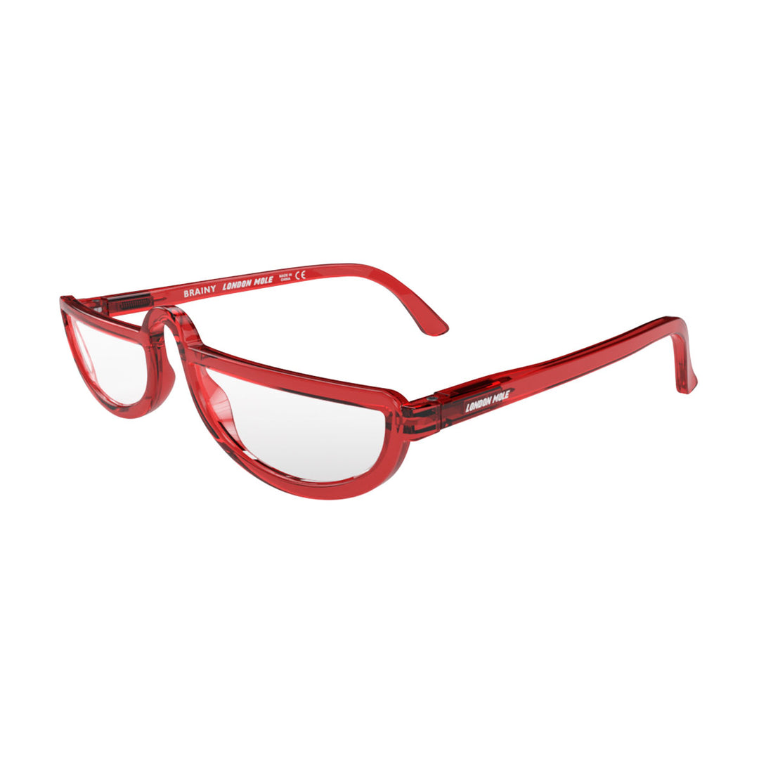 Open skew - Brainy Blue Blocker Glasses in transparent red featuring a half-moon frame and the ability to protect your eyes from artificial blue light. Ideal for fashion accessories, screen time, office work, gaming, scrolling on a mobile, and watching TV. 