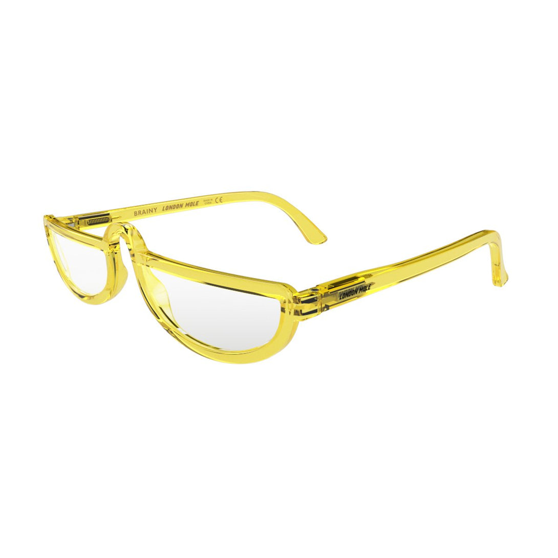 Open skew - Brainy Blue Blocker Glasses in transparent yellow featuring a half-moon frame and the ability to protect your eyes from artificial blue light. Ideal for fashion accessories, screen time, office work, gaming, scrolling on a mobile, and watching TV. 