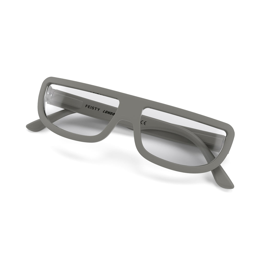 Closed skew - Feisty Blue Blocker Glasses in matt grey featuring a half-moon frame and the ability to protect your eyes from artificial blue light. Ideal for fashion accessories, screen time, office work, gaming, scrolling on a mobile, and watching TV. 