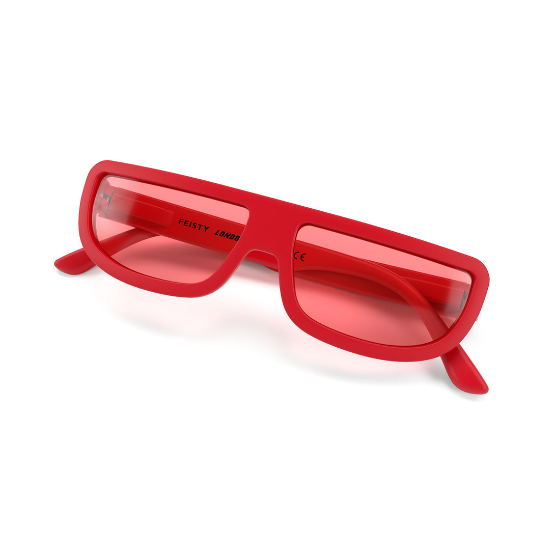 Folded skew - Feisty sunglasses in matt red featuring a utilitarian, straight top line frame and red UV400 lenses. The finishing touch to every outfit while protecting your eyes. 