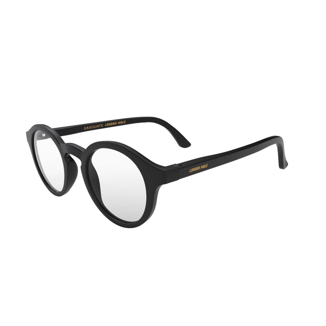 Open Skew - Graduate Blue Blocker Glasses in matt black featuring a soft circle frame and the ability to protect your eyes from artificial blue light. Ideal for fashion accessories, screen time, office work, gaming, scrolling on a mobile, and watching TV. 