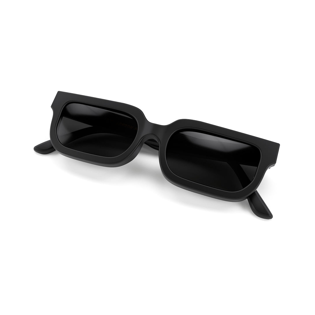 Folded skew - Icy sunglasses in matt black featuring a bold rectangle frame and black UV400 lenses. The finishing touch to every outfit while protecting your eyes. 