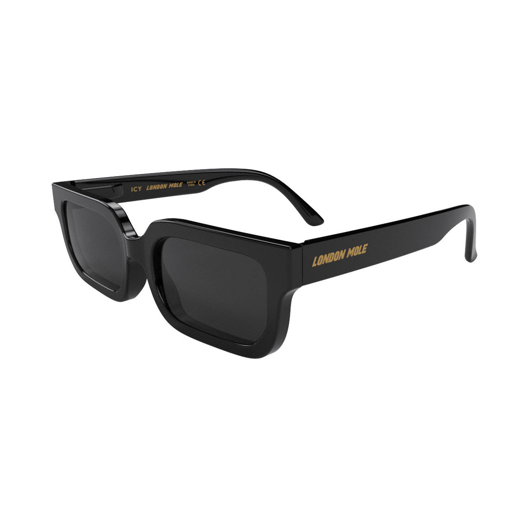Open skew - Icy sunglasses in gloss black featuring a bold rectangle frame and black UV400 lenses. The finishing touch to every outfit while protecting your eyes. 