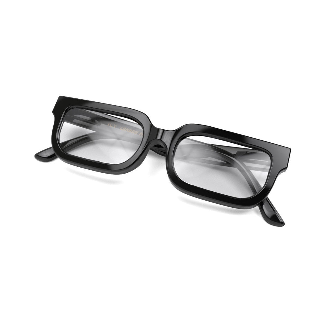 Folded skew - Icy Blue Blocker Glasses in gloss black featuring a bold rectangle frame and the ability to protect your eyes from artificial blue light. Ideal for fashion accessories, screen time, office work, gaming, scrolling on a mobile, and watching TV. 