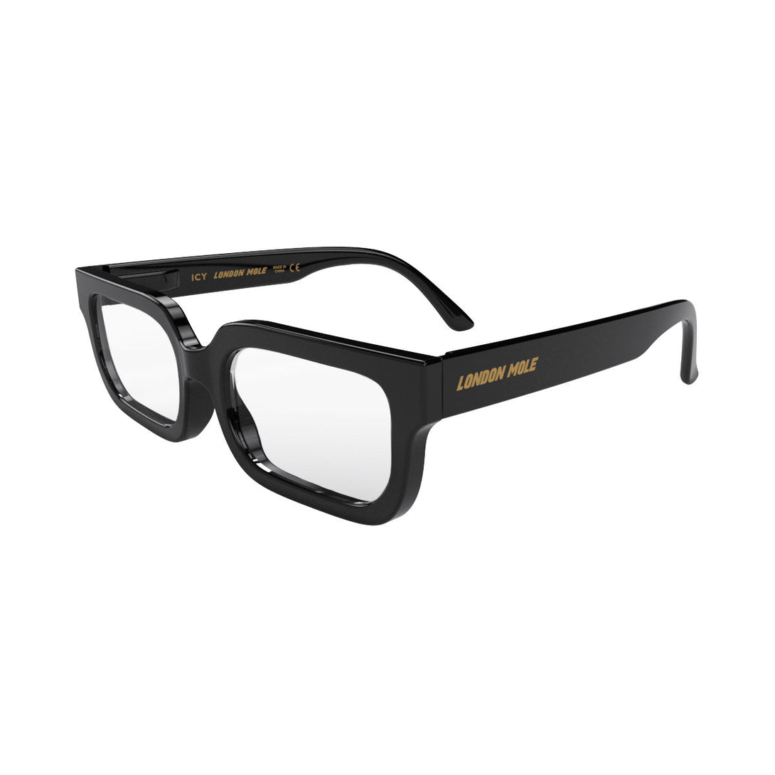 Open skew - Icy Blue Blocker Glasses in gloss black featuring a bold rectangle frame and the ability to protect your eyes from artificial blue light. Ideal for fashion accessories, screen time, office work, gaming, scrolling on a mobile, and watching TV. 