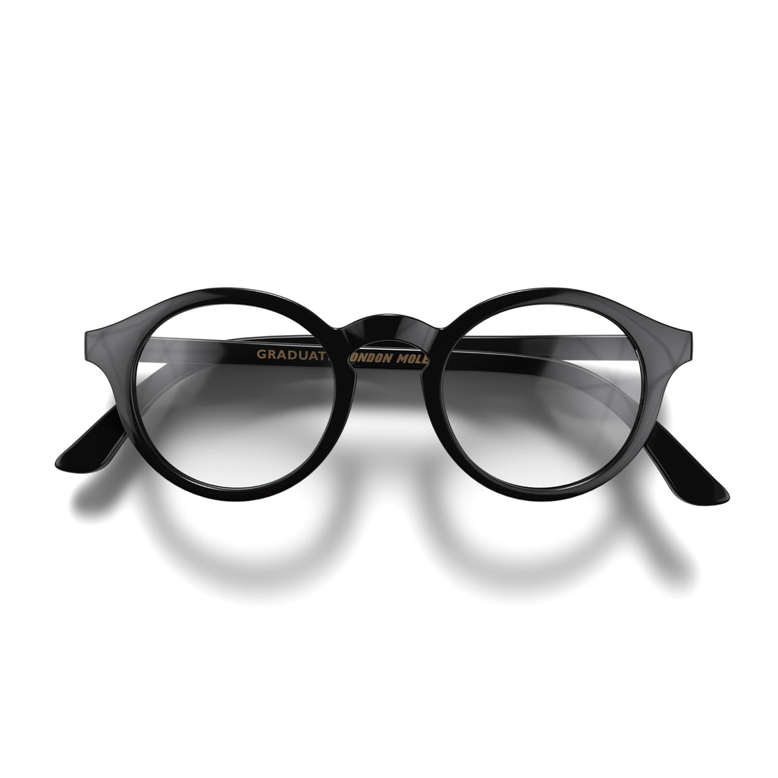 Front - Graduate Reading Glasses in gloss black featuring a soft circle frame and provide crystal clear vision. Available in a + 1, 1.5, 2, 2.5, 3 prescriptions.