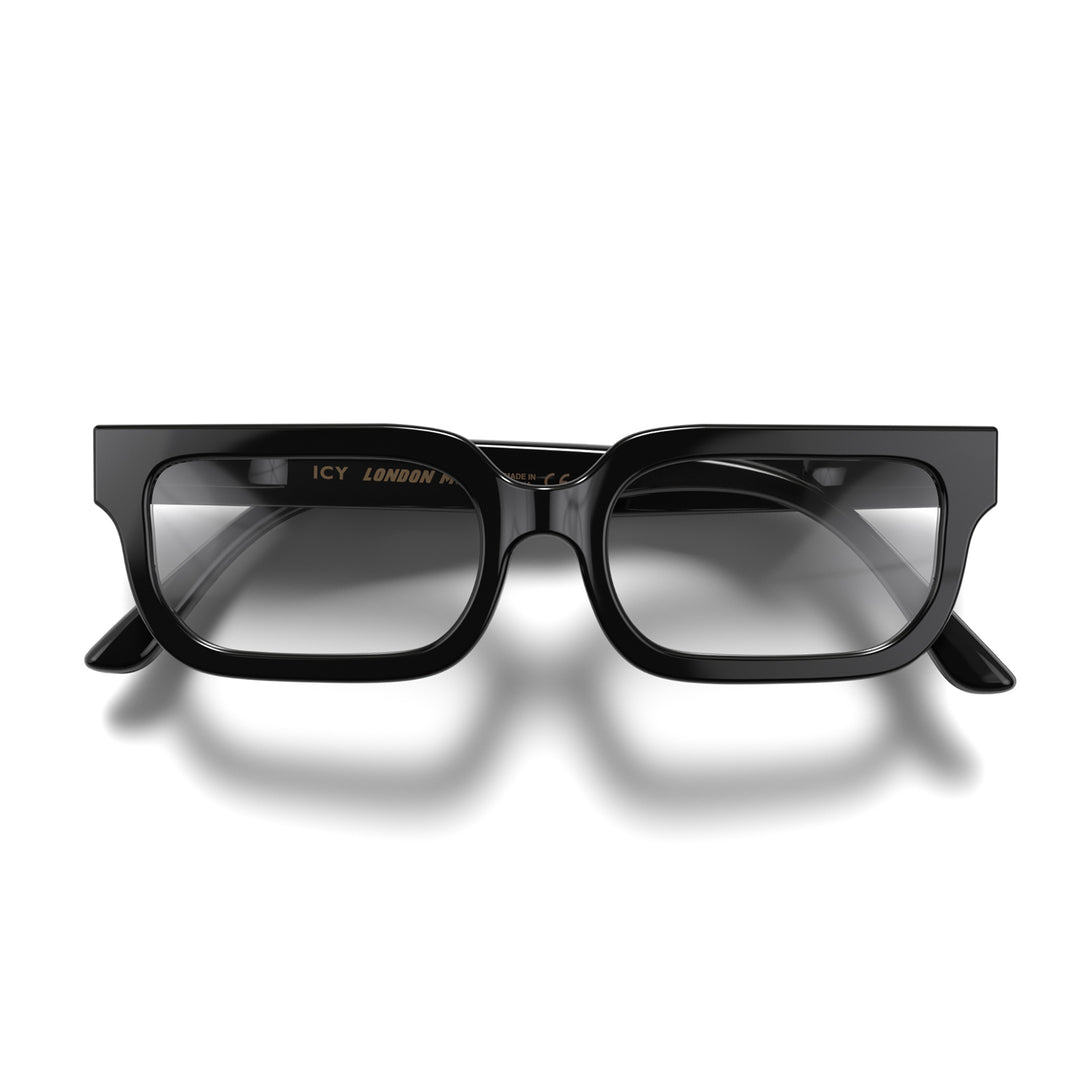 Front - Icy Blue Blocker Glasses in gloss black featuring a bold rectangle frame and the ability to protect your eyes from artificial blue light. Ideal for fashion accessories, screen time, office work, gaming, scrolling on a mobile, and watching TV. 