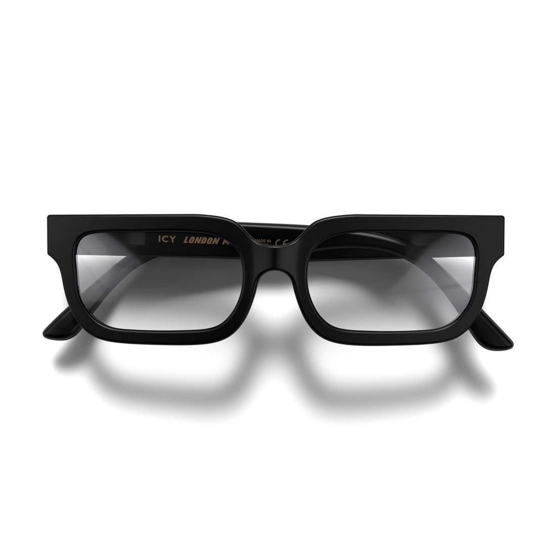 Front - Icy Reading Glasses in matt black featuring a bold rectangle frame and provide crystal clear vision. Available in a + 1, 1.5, 2, 2.5, 3 prescriptions.