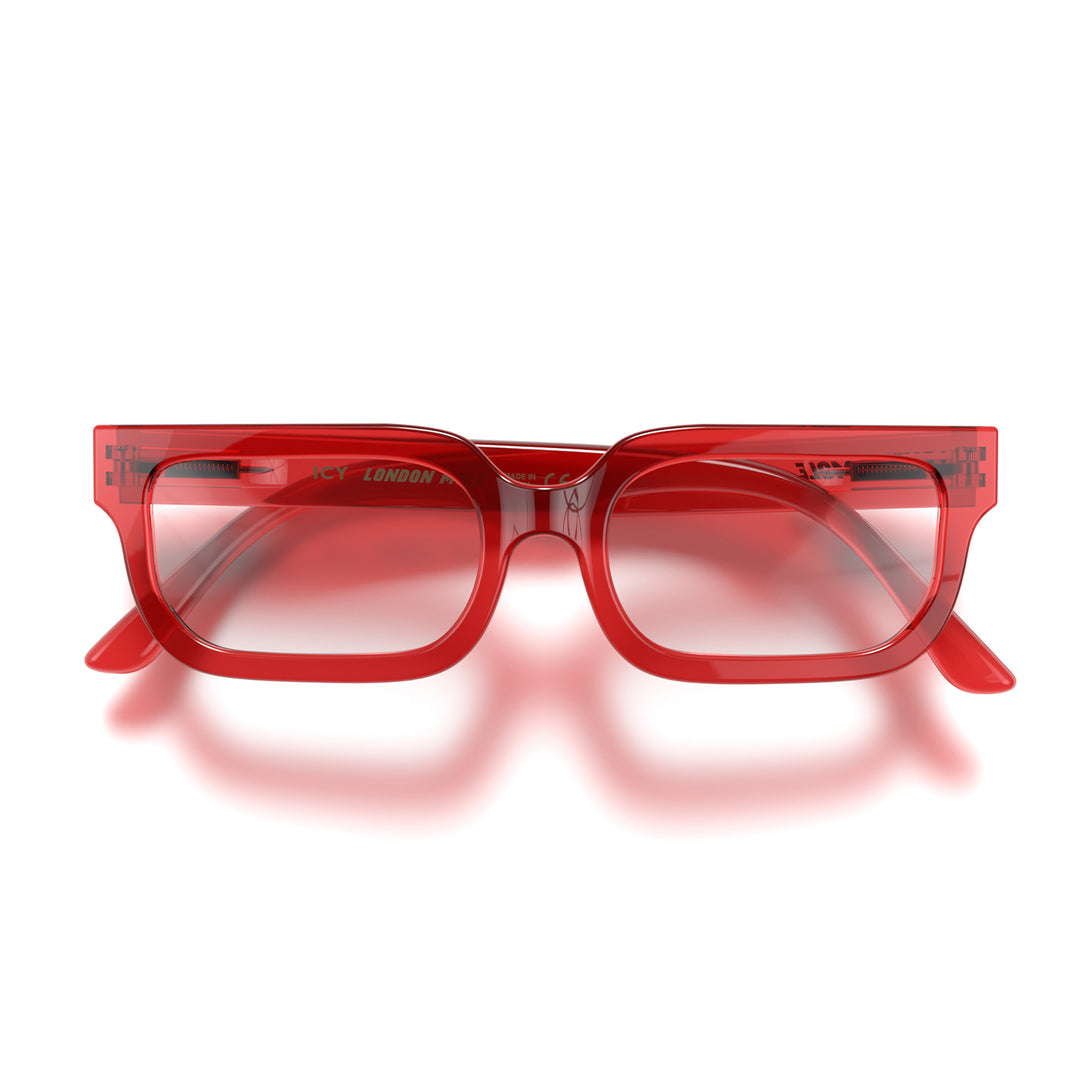 Front - Icy Blue Blocker Glasses in transparent red featuring a bold rectangle frame and the ability to protect your eyes from artificial blue light. Ideal for fashion accessories, screen time, office work, gaming, scrolling on a mobile, and watching TV. 