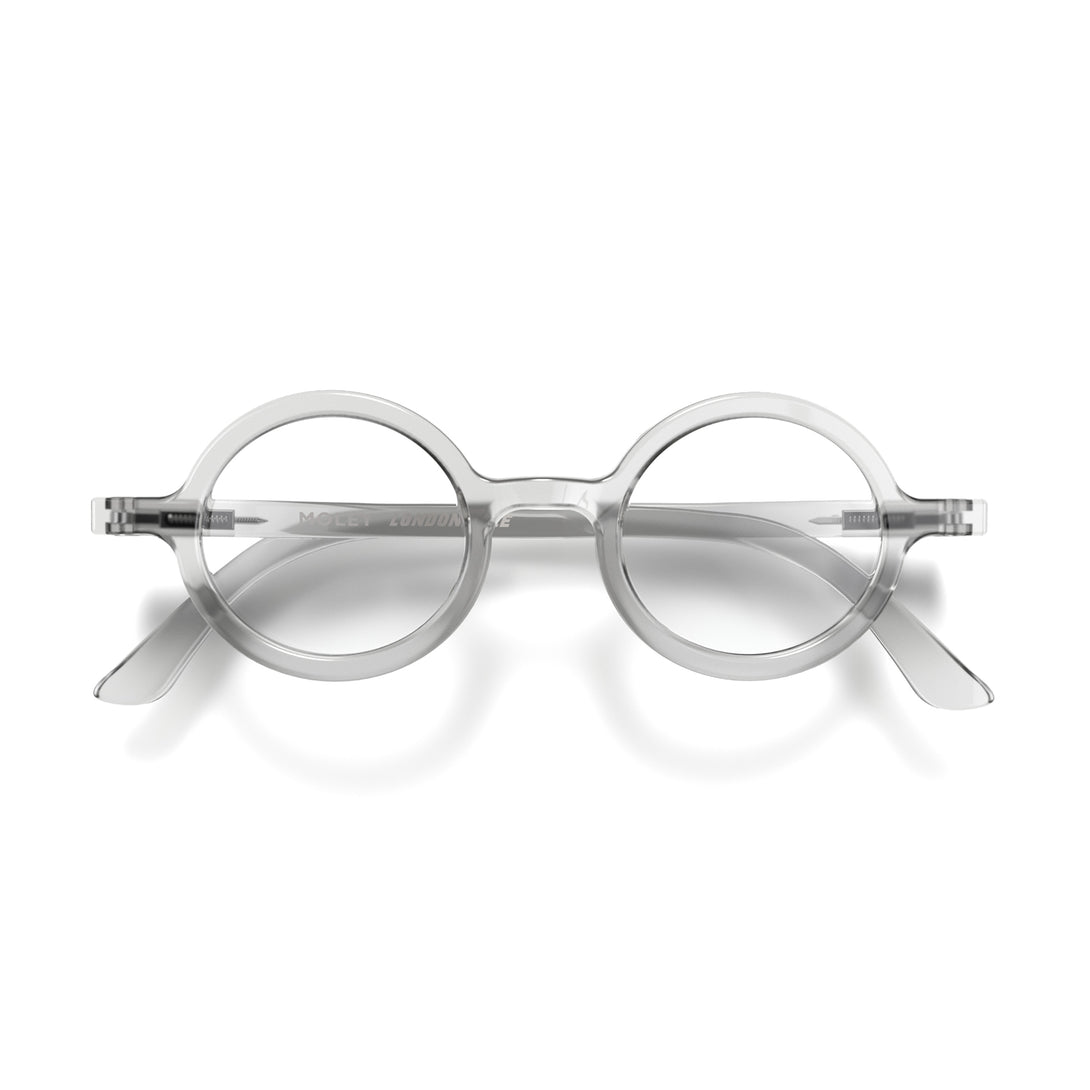 Front - Moley Reading Glasses featuring an eccentrically round, transparent frame and provide crystal clear vision. Available in a + 1, 1.5, 2, 2.5, 3 prescriptions.