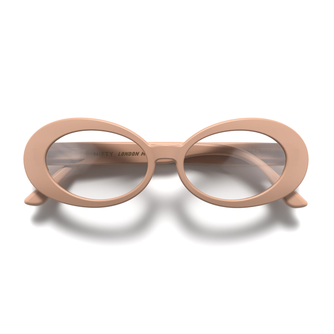 Front - Nifty Blue Blocker Glasses in soft pink featuring a bold, vintage oval frame and the ability to protect your eyes from artificial blue light. Ideal for fashion accessories, screen time, office work, gaming, scrolling on a mobile, and watching TV. 
