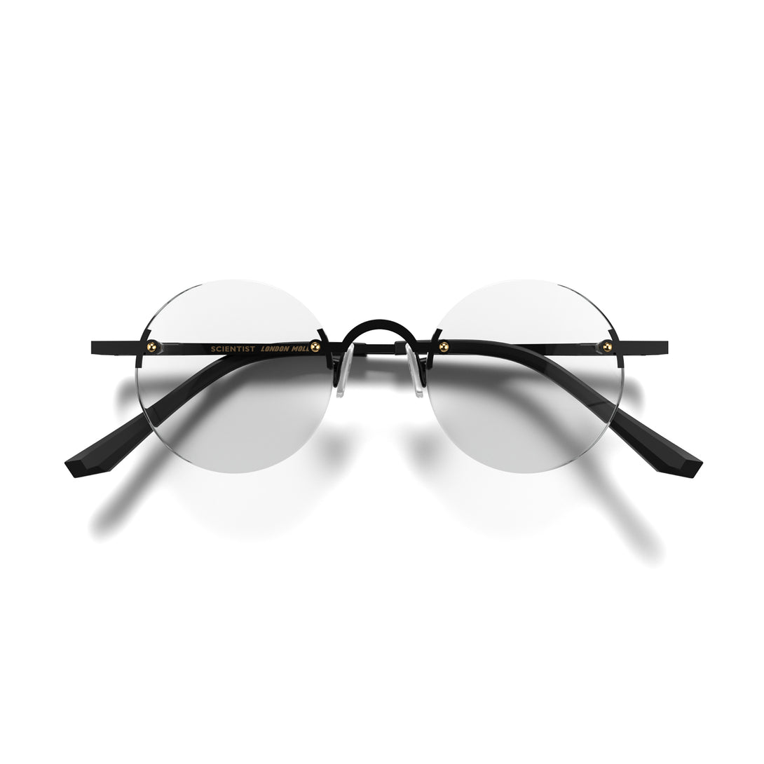 Front - Scientist Reading Glasses in matt black offering a frameless lens and matt black temples while providing crystal clear vision. Available in a + 1, 1.5, 2, 2.5, 3 prescriptions.