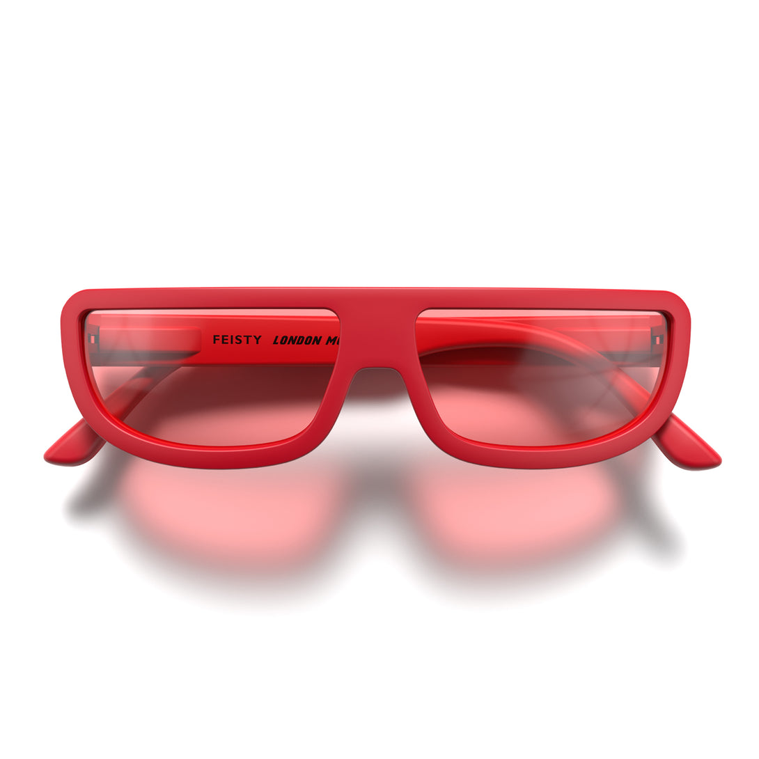 Front - Feisty sunglasses in matt red featuring a utilitarian, straight top line frame and red UV400 lenses. The finishing touch to every outfit while protecting your eyes. 