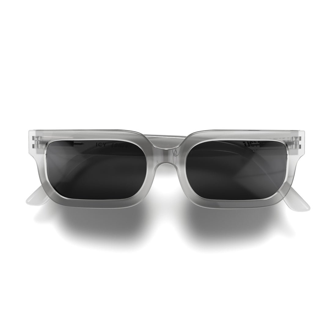 Front - Icy sunglasses featuring a bold rectangle, transparent frame and black UV400 lenses. The finishing touch to every outfit while protecting your eyes. 