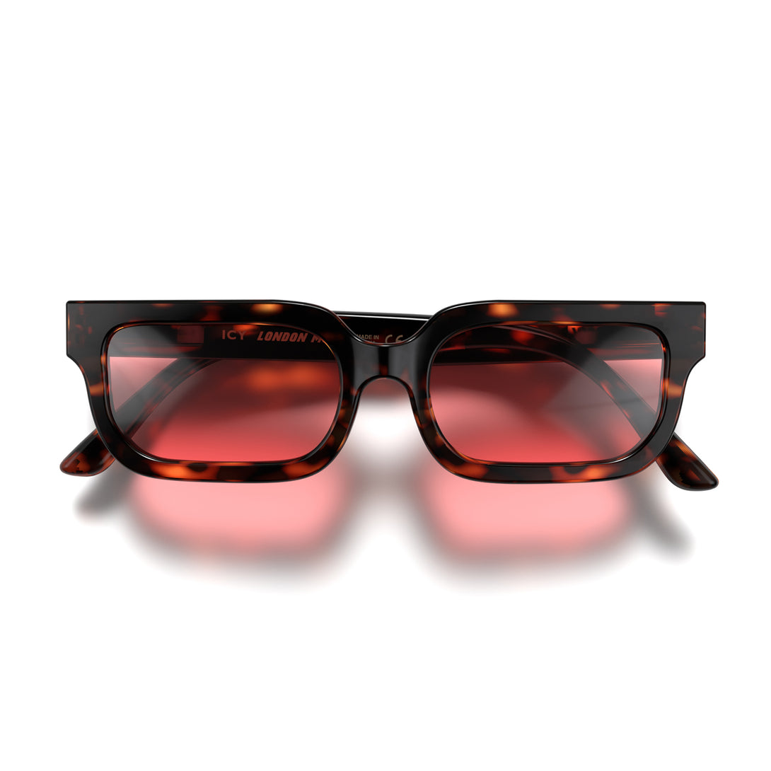 Front - Icy sunglasses in gloss tortoiseshell featuring a bold rectangle frame and red UV400 lenses. The finishing touch to every outfit while protecting your eyes. 