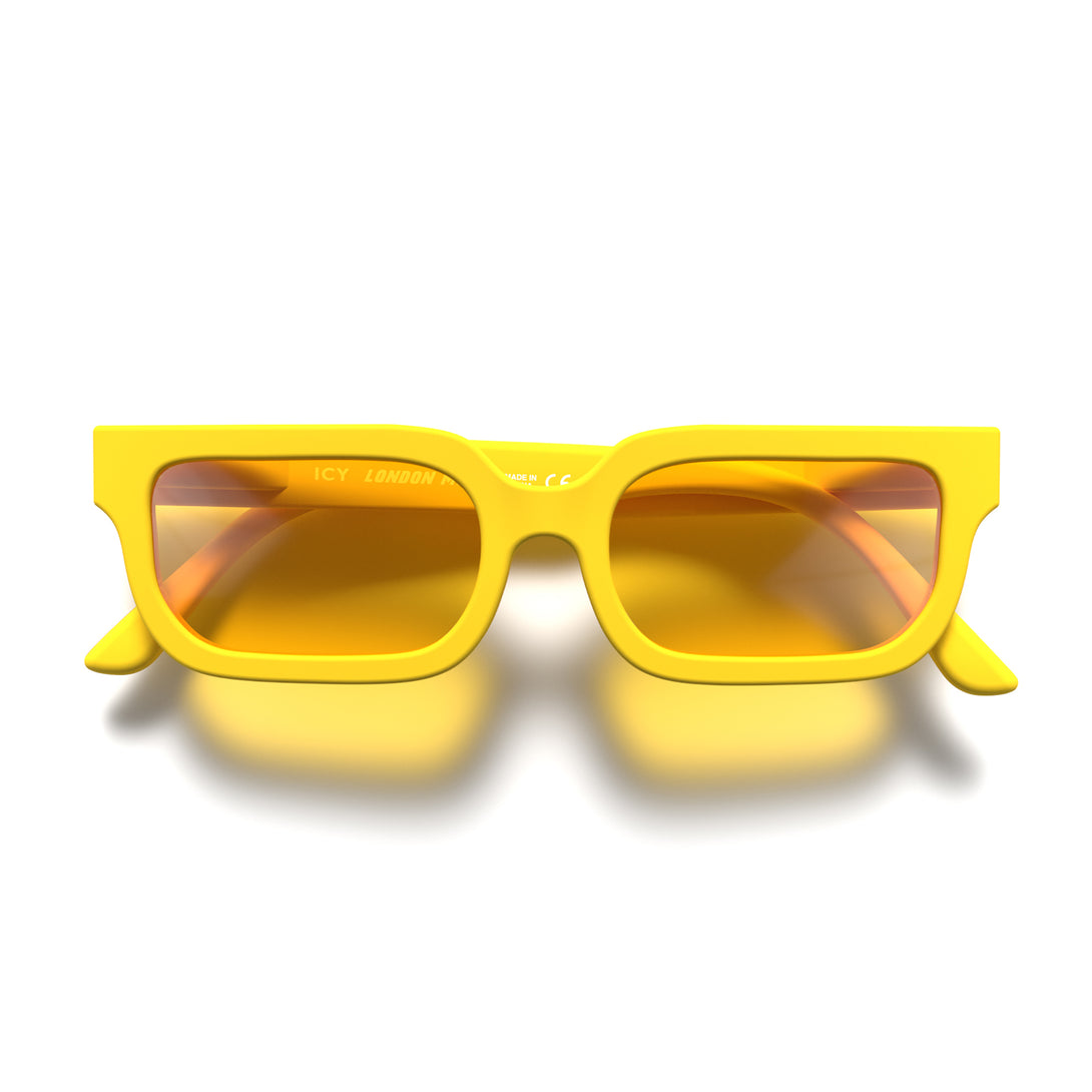 Front - Icy sunglasses in matt yellow featuring a bold rectangle frame and yellow UV400 lenses. The finishing touch to every outfit while protecting your eyes. 