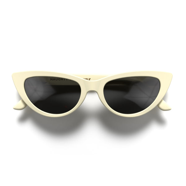 front - Naughty sunglasses in matt cream featuring a classic cat-eye frame and black UV400 lenses. The perfect accessory.