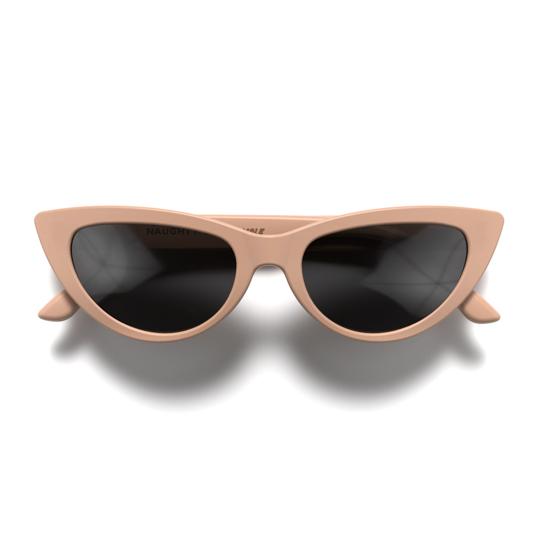 Front - Naughty sunglasses in soft pink featuring a classic cat-eye frame and black UV400 lenses. The perfect accessory.
