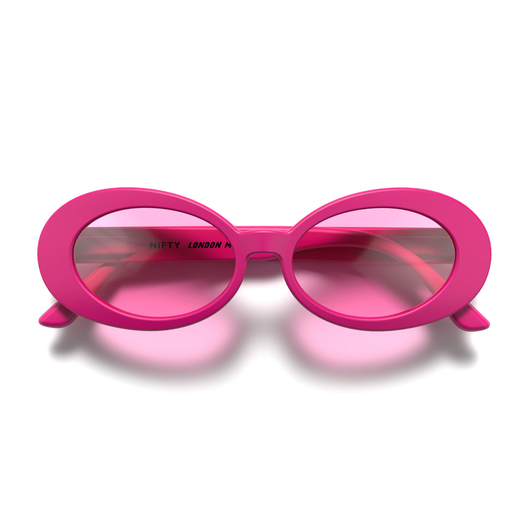 Front - Nifty sunglasses in matt pink featuring a bold, vintage oval frame and pink UV400 lenses. The perfect accessory.