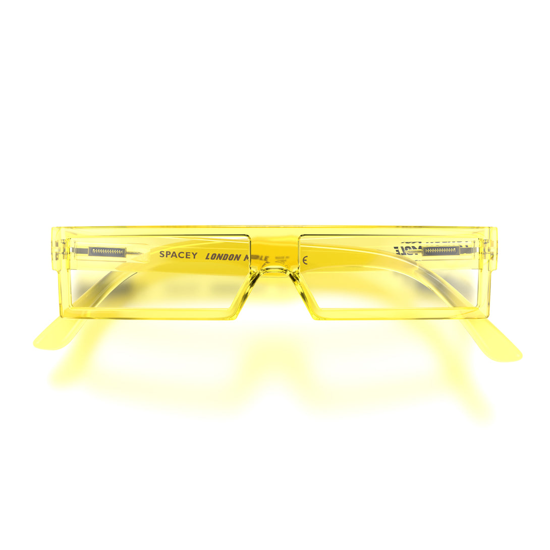 front - Spacey Blue Blocker Glasses in transparent yellow featuring a modern rectangle frame with a utilitarian look and the ability to protect your eyes from artificial blue light. Ideal for fashion accessories, screen time, office work, gaming, scrolling on a mobile, and watching TV. 