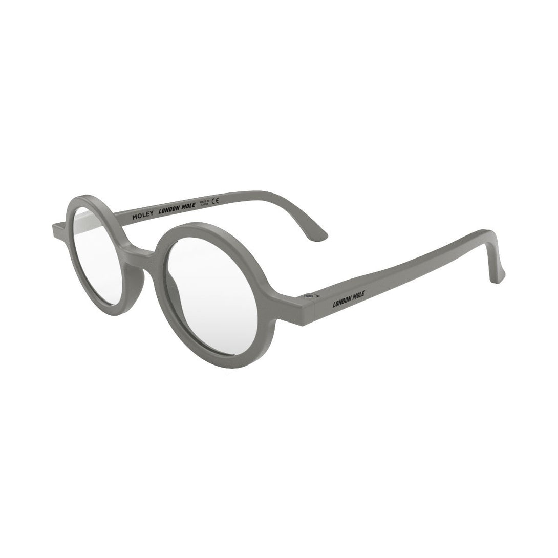 Open Skew - Moley Reading Glasses in matt grey featuring an eccentrically round frame and provide crystal clear vision. Available in a + 1, 1.5, 2, 2.5, 3 prescriptions.