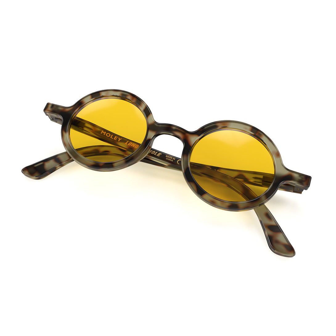 Front view folded of Moley Sunglasses by London Mole with Grey Tortoise Shell Frames and Yellow Lenses