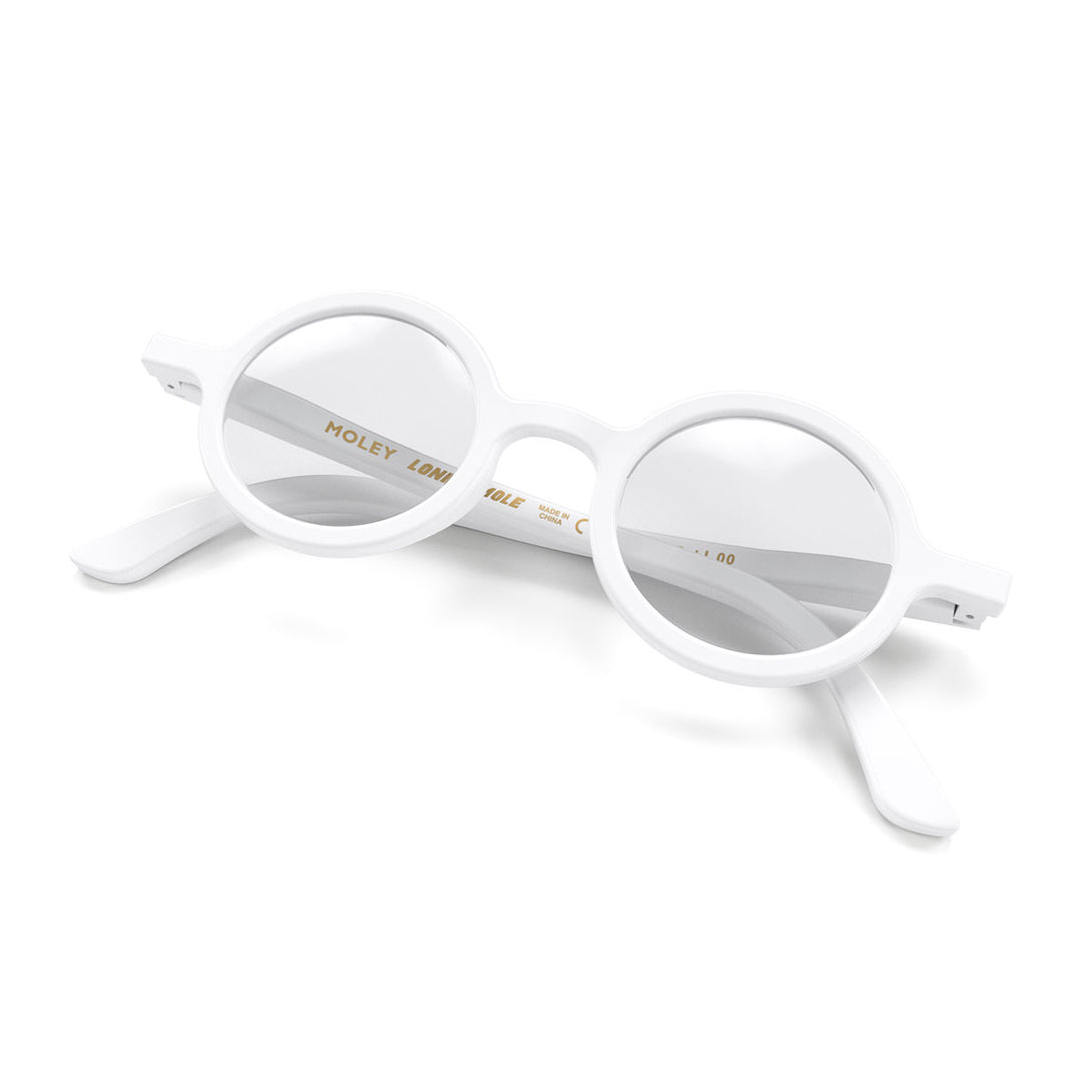 Folded skew - Moley Reading Glasses in matt white featuring an eccentrically round frame and provide crystal clear vision. Available in a + 1, 1.5, 2, 2.5, 3 prescriptions.
