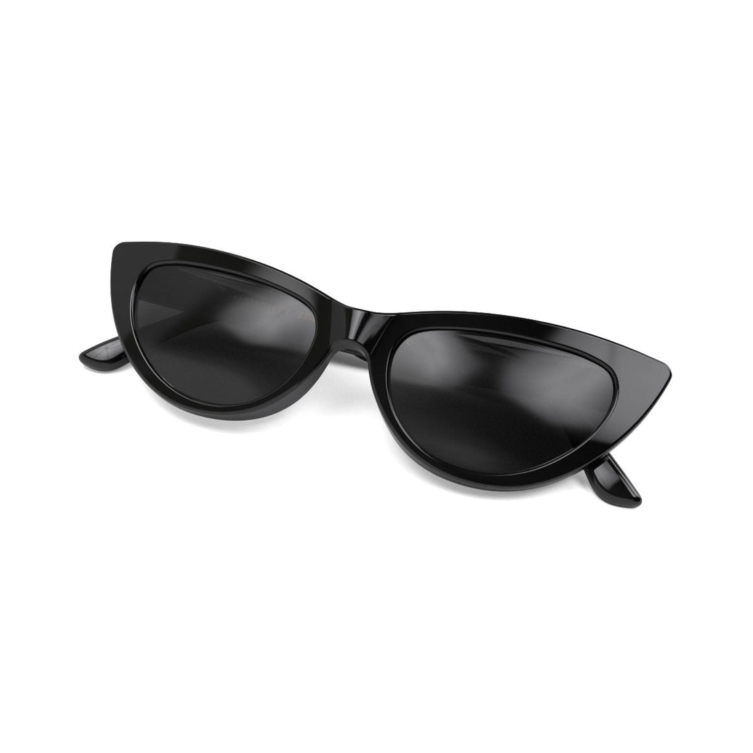 Folded skew - Naughty sunglasses in gloss black featuring a classic cat-eye frame and black UV400 lenses. The perfect accessory.