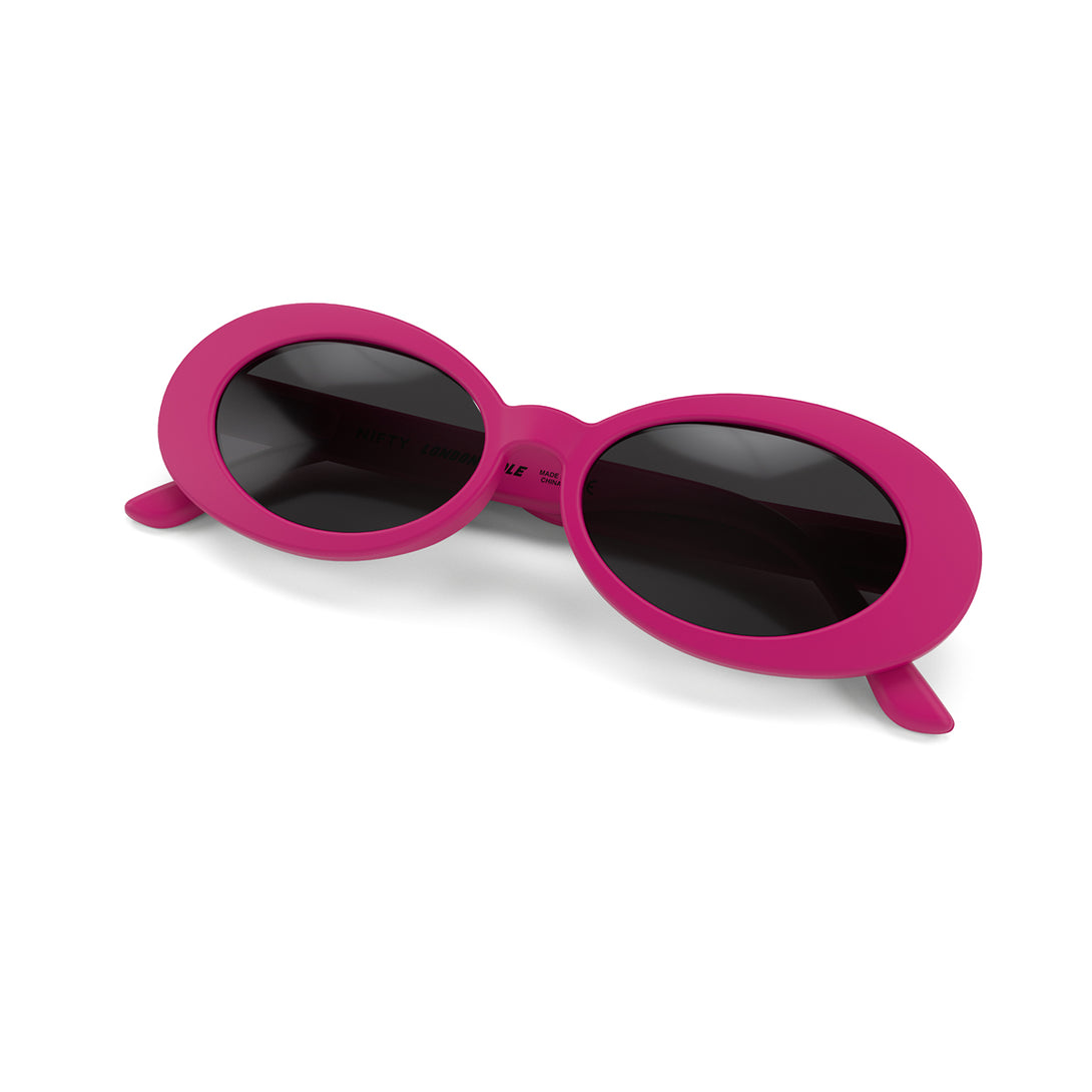Front view folded of Nifty Sunglasses by London Mole with Pink Frames and Black Lenses