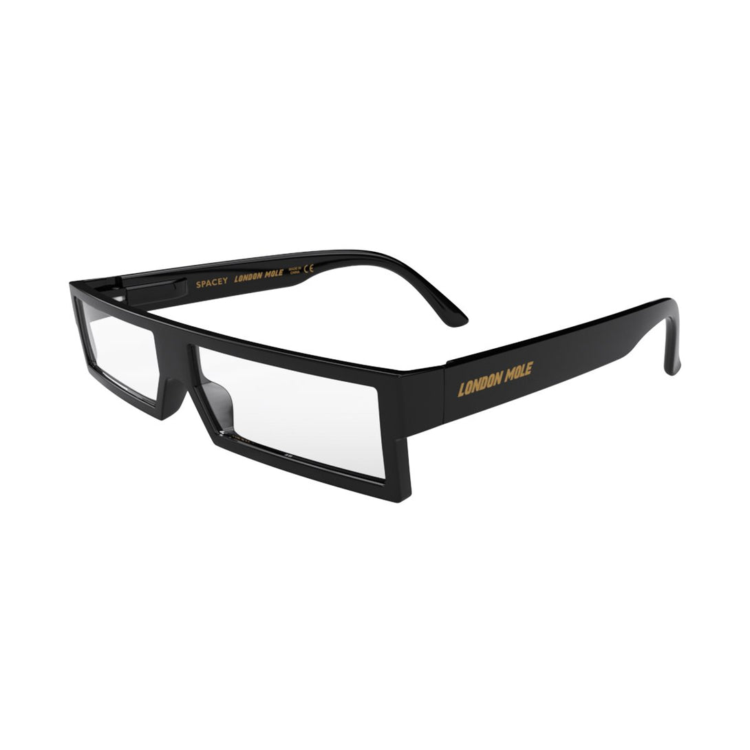 Open skew - Spacey Blue Blocker Glasses ingloss black featuring a modern rectangle frame with a utilitarian look and the ability to protect your eyes from artificial blue light. Ideal for fashion accessories, screen time, office work, gaming, scrolling on a mobile, and watching TV. 