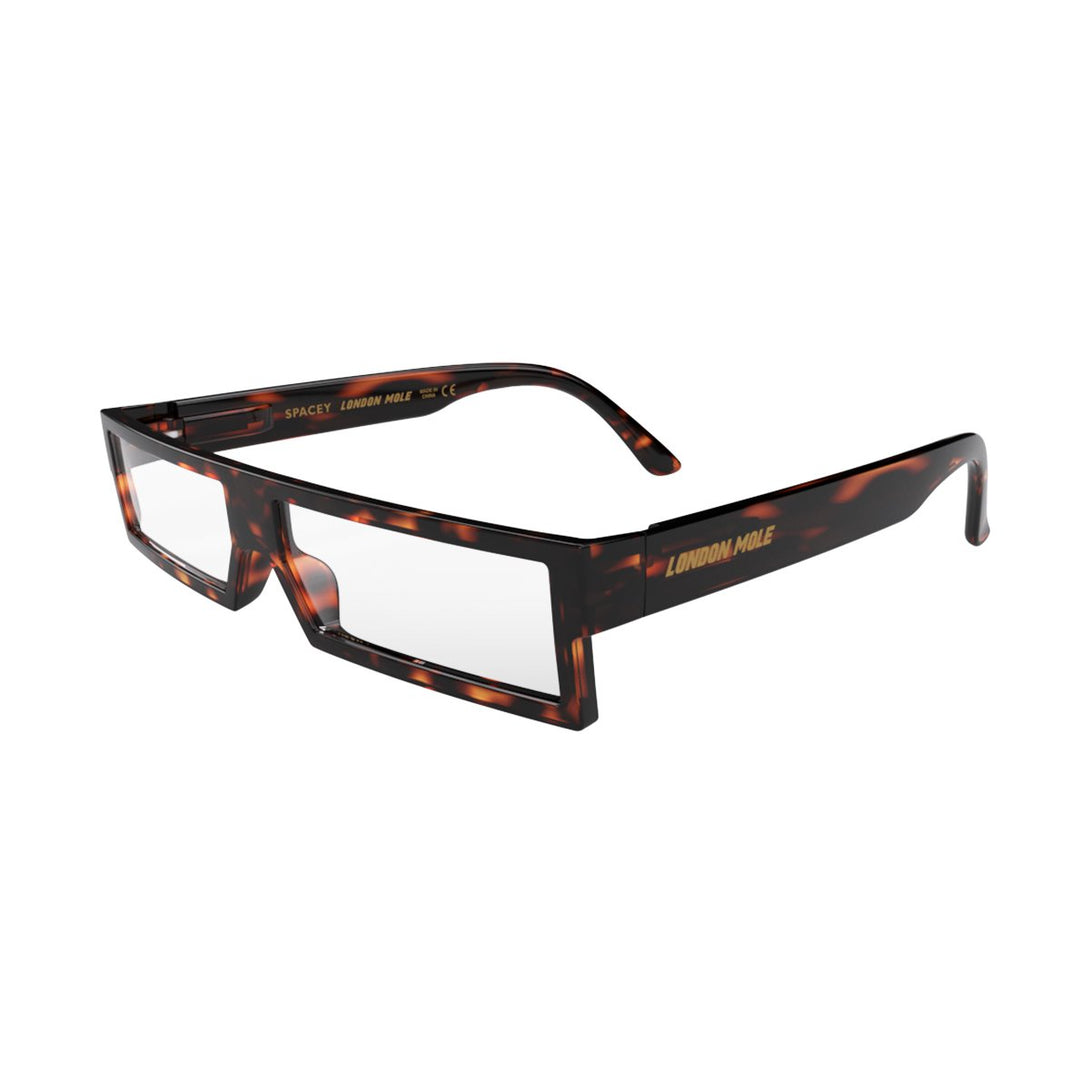 Open skew - Spacey Reading Glasses in gloss tortoiseshell featuring a modern rectangle frame with a utilitarian look and providing crystal clear vision. Available in a + 1, 1.5, 2, 2.5, 3 prescriptions.