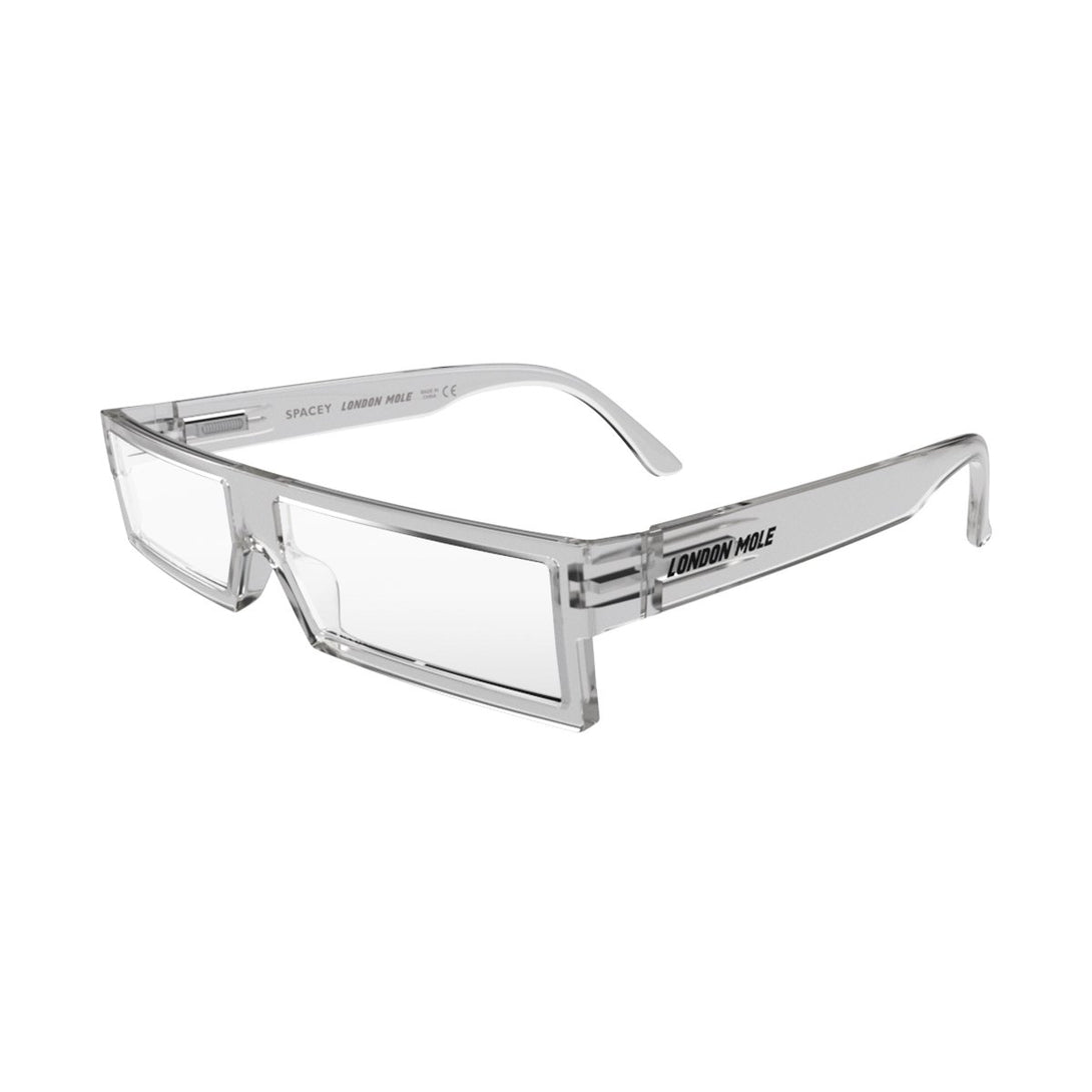 Open skew - Spacey Blue Blocker Glasses in transparent featuring a modern rectangle frame with a utilitarian look and the ability to protect your eyes from artificial blue light. Ideal for fashion accessories, screen time, office work, gaming, scrolling on a mobile, and watching TV. 