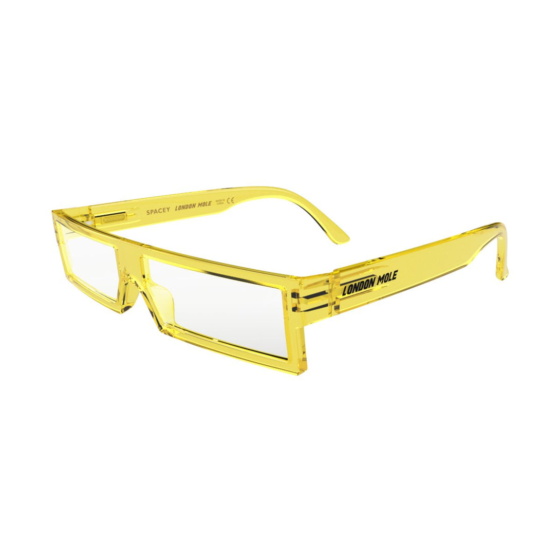 Open skew view of the London Mole Spacey Blue Blocker Glasses in Transparent Yellow